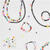 Kunststoff-Perlen Itoshii, Buchstaben, rund, transparent, 7 x 4 mm, 165 Stk, Rosa Bild 4